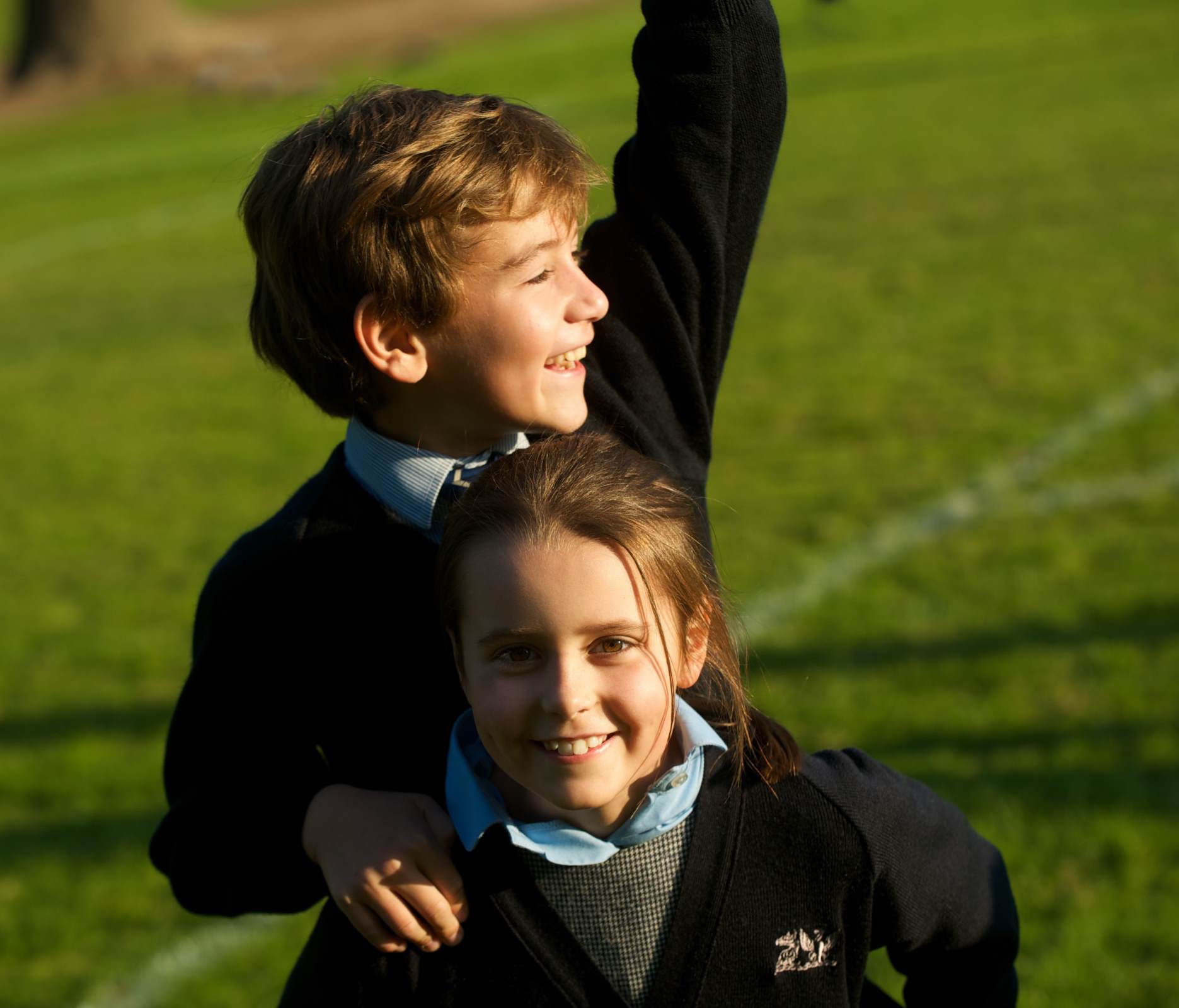 boy and girl in school uniform